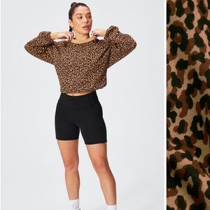 . 60%cotton 40% polyester 
Medium NWT and never worn. 
Sold out item.